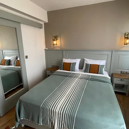 Oikos Apartahotel *
