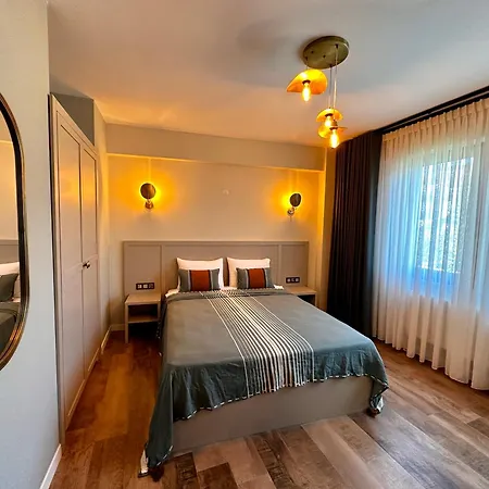 Oikos Apartahotel *